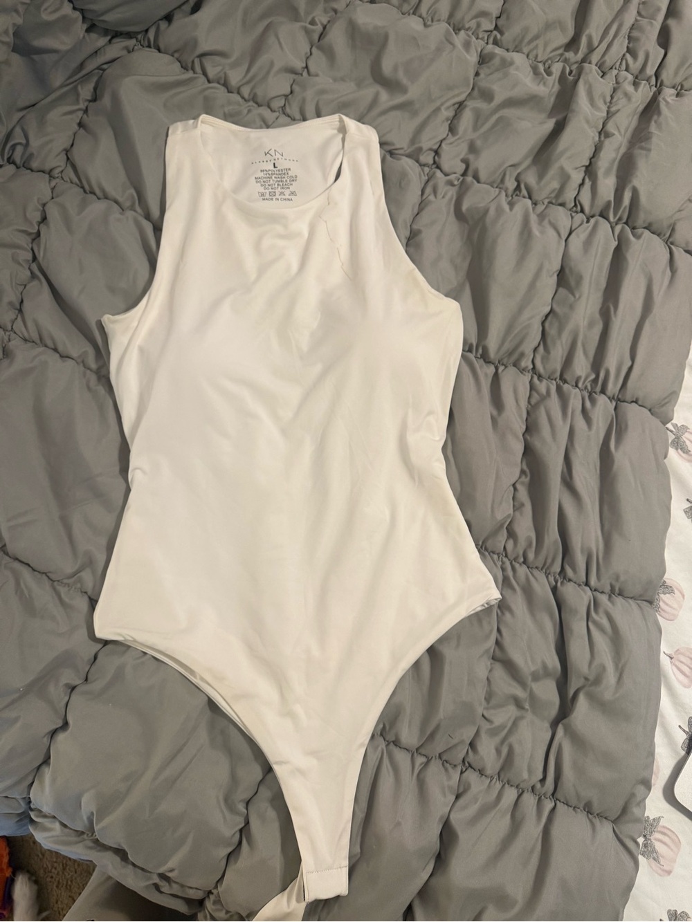 Klassy Network White Sleeveless Bodysuit